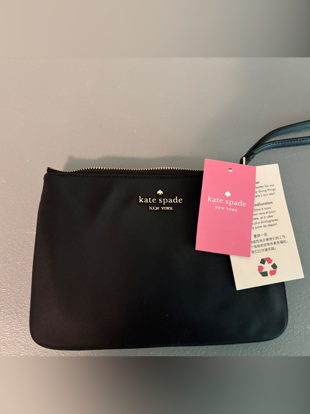 kate spade Black Zip Wristlet with Gold Logo